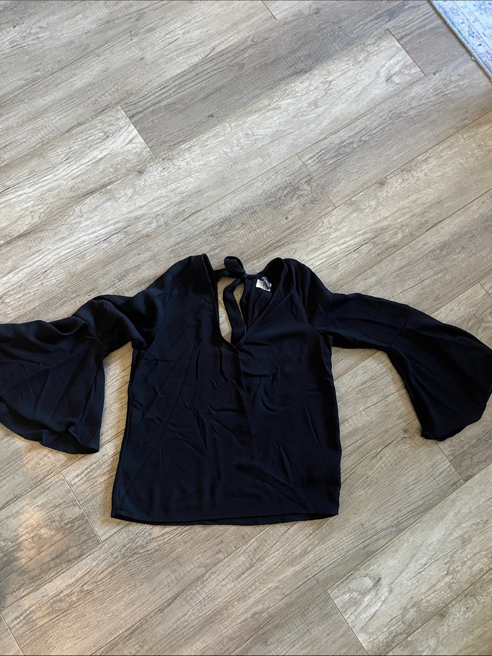 Divided Black Bell-Sleeve Tie-Neck Blouse